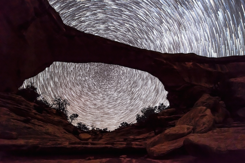Illustration for article titled Dark Skies Over a Natural Bridge